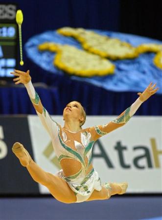 Finland's Marleena Saresvirta performs with clubs during the 27th World Rhythmic Gymnastics Championship in Baku, Oct. 6, 2005